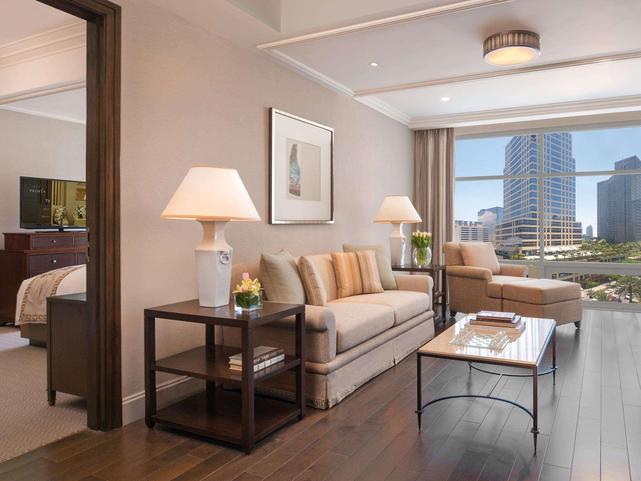 Discovery Primea Makati City Exterior photo A suite at the Mandarin Oriental, Hong Kong