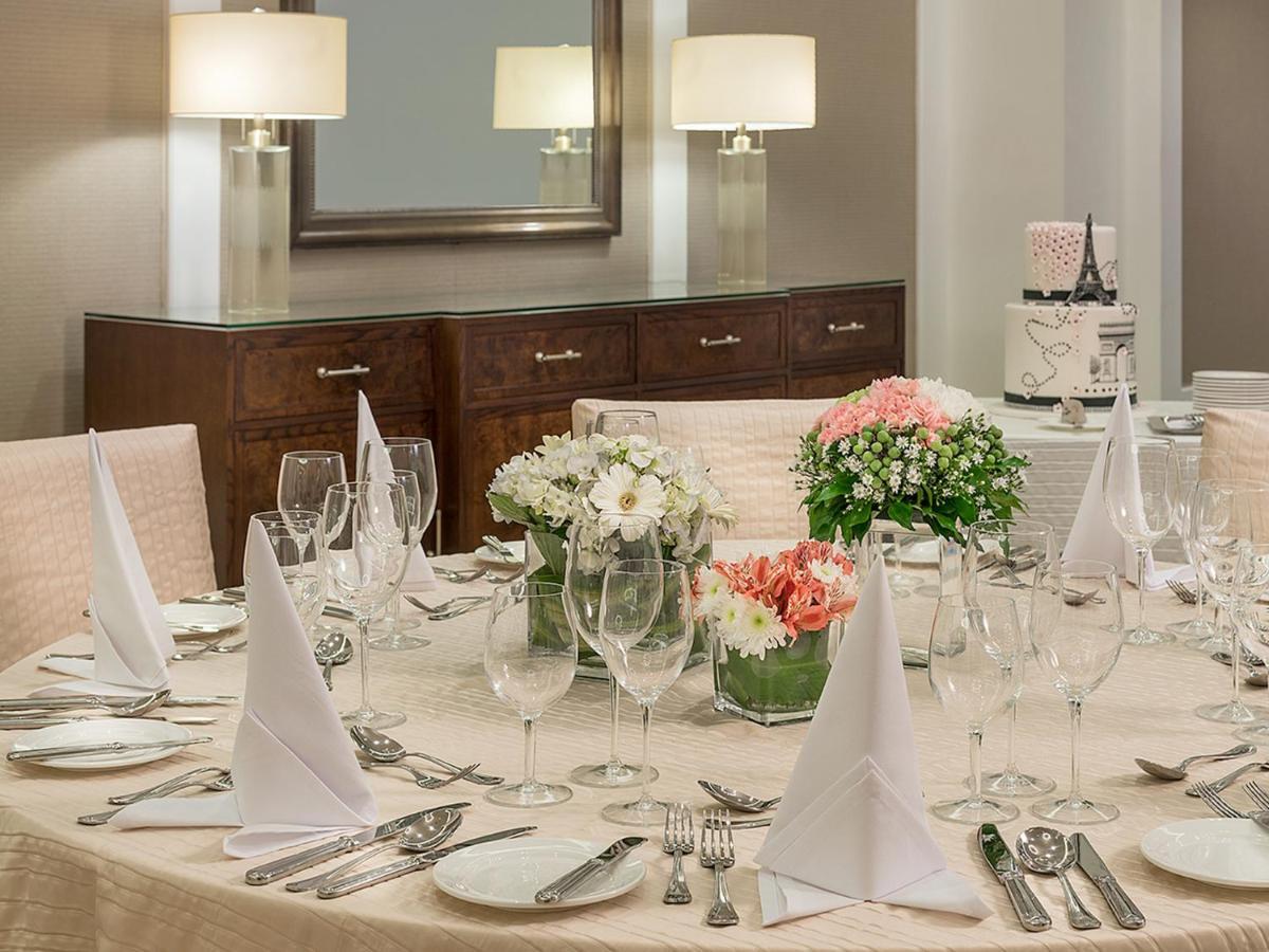 Discovery Primea Makati City Exterior photo A table set for a formal dinner